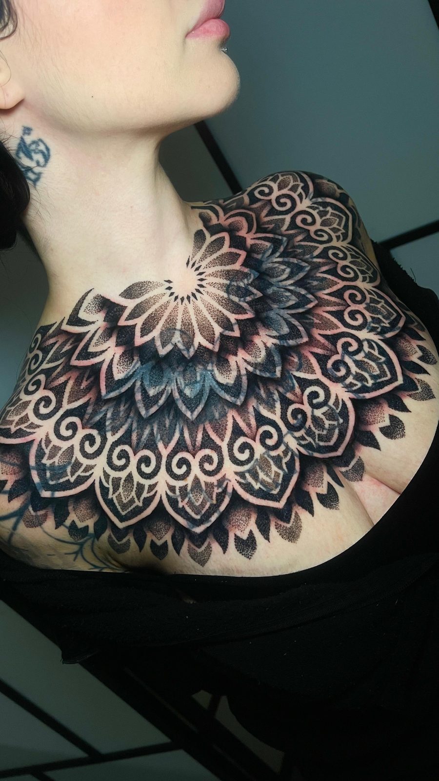 Chest mandala — dotwork sternum tattoo